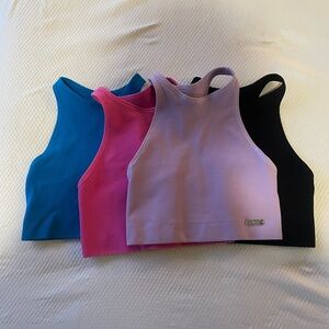 Bombshell Sportswear Blue Pink Purple Black 
Sleeveless Crop Tank Top!